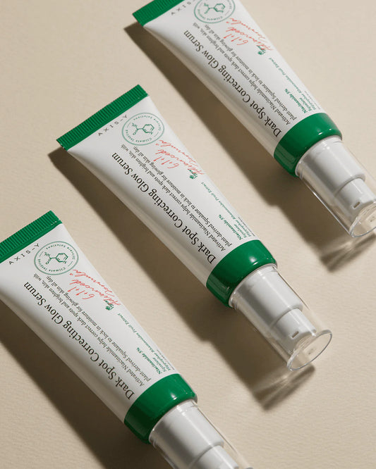 Glow correcting dark spot serum